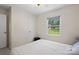 Inviting bedroom with natural light and neutral finishes throughout the room at 1713 Andover Nw St, Concord, NC 28027