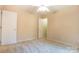 A neutral bedroom features carpet flooring, a ceiling fan and white doors and trim at 2019 Steeplechase Dr, Rock Hill, SC 29732