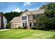 Beautiful home with manicured lawn and mature trees at 2019 Steeplechase Dr, Rock Hill, SC 29732