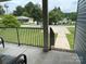 View from the front porch with black railing at 210 Rhyne St, Stanley, NC 28164