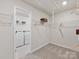 Large closet space with washer, dryer, and wire shelving at 2143 Rolling Hills Ct, Stanley, NC 28164