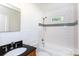 Classic bathroom with subway tile, updated fixtures, and a dark granite vanity at 2628 Clydesdale Ter, Charlotte, NC 28208