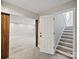 Finished basement with carpet and an adjacent room by the open door at 3124 5Th Street Ne Pl, Hickory, NC 28601