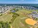 A high aerial view showcasing community sports fields, a pond, and residential areas at 3145 Bridgewater St, Lancaster, SC 29720