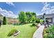 Well-maintained backyard with lush lawn, landscaping, and patio area at 3145 Bridgewater St, Lancaster, SC 29720