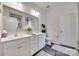 Bright bathroom featuring a double sink vanity with white cabinets and decorative accents at 3145 Bridgewater St, Lancaster, SC 29720