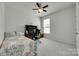Neutral bedroom featuring a ceiling fan, a window and a desk with computer workstation at 3145 Bridgewater St, Lancaster, SC 29720
