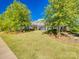 Beautiful clubhouse featuring a covered front porch and surrounded by a well-manicured lawn at 3145 Bridgewater St, Lancaster, SC 29720