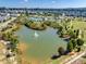 Scenic community pond with a fountain, walking paths, and lush landscaping at 3145 Bridgewater St, Lancaster, SC 29720