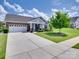 Charming single-story home with a two-car garage, manicured lawn, and inviting front porch at 3145 Bridgewater St, Lancaster, SC 29720