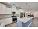 Open kitchen features a large island, stainless appliances, and ample cabinet space at 3145 Bridgewater St, Lancaster, SC 29720