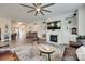 Open concept living room with fireplace, built-in shelving and views of a dining area at 3145 Bridgewater St, Lancaster, SC 29720