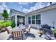 Cozy patio with outdoor dining set and grill, perfect for entertaining at 3145 Bridgewater St, Lancaster, SC 29720