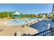 Community pool featuring a splash area, lounge chairs, and a partially covered picnic area at 3145 Bridgewater St, Lancaster, SC 29720