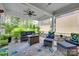 Covered porch with ceiling fan, comfortable seating, and view of backyard at 3145 Bridgewater St, Lancaster, SC 29720