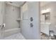Tiled shower with a built-in seat and shelf, featuring a seamless glass enclosure at 3145 Bridgewater St, Lancaster, SC 29720