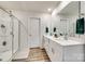 This bathroom offers a shower with a glass enclosure and a double sink vanity at 322 Olympia Way, York, SC 29745