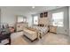 This bedroom offers natural light from two windows and neutral walls at 322 Olympia Way, York, SC 29745