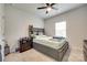 Comfortable bedroom with carpet, a ceiling fan, and neutral decor at 322 Olympia Way, York, SC 29745