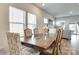 Cozy dining area with a wooden table and large windows for natural light at 322 Olympia Way, York, SC 29745