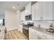 Well-equipped kitchen featuring modern appliances, granite counters, and ample cabinet space at 322 Olympia Way, York, SC 29745
