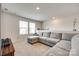This living room features a large sectional sofa and a window for natural light at 322 Olympia Way, York, SC 29745