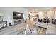 Bright living room offering a comfortable seating area with decor and easy access to the kitchen at 322 Olympia Way, York, SC 29745