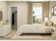 Serene bedroom with a large window providing natural light, a walk-in closet, and plush bedding at 3887 Horsham St, Indian Land, SC 29707