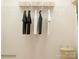 Organized walk-in closet with hanging storage, wire shelving, and a decorative basket for accessories at 3887 Horsham St, Indian Land, SC 29707