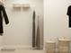Walk-in closet features hanging rods, shelving, baskets and neutral-toned carpet at 3887 Horsham St, Indian Land, SC 29707