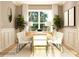 Bright dining room with modern furnishings and large windows at 3887 Horsham St, Indian Land, SC 29707