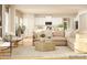 Cozy living room with a sectional sofa, round coffee table, and an open layout to the modern kitchen at 3887 Horsham St, Indian Land, SC 29707