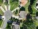 Aerial view of a home in a residential neighborhood, showcasing the roof, landscaping, and cul-de-sac at 4003 Fine Robe Dr, Indian Trail, NC 28079