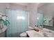 Well-lit bathroom featuring a vanity, toilet, shower, and neatly arranged towels at 4003 Fine Robe Dr, Indian Trail, NC 28079
