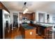 Open kitchen features granite countertops, stainless steel appliances, and a center island at 4003 Fine Robe Dr, Indian Trail, NC 28079
