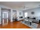 Bright living room featuring hardwood floors, neutral walls, and plenty of natural light at 4003 Fine Robe Dr, Indian Trail, NC 28079