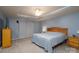 Well-lit main bedroom featuring a tray ceiling, fan, and coordinating bedside tables at 4003 Fine Robe Dr, Indian Trail, NC 28079