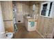Bathroom with vintage tiles and fixtures, offering a chance to renovate and create a modern oasis at 402 Villa St, Kannapolis, NC 28083