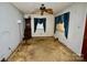 Living room with classic fixtures and dated carpet, offering a blank canvas for a stylish makeover at 402 Villa St, Kannapolis, NC 28083