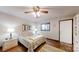 Bedroom with hardwood floors, neutral walls, ceiling fan, and a window at 4920 Surfwood Dr, Sherrills Ford, NC 28673