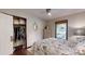 Bright bedroom with closet, dresser, and view to the outside at 4920 Surfwood Dr, Sherrills Ford, NC 28673