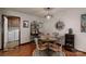 Dining area features a round table, modern light fixture and decorative wall art at 4920 Surfwood Dr, Sherrills Ford, NC 28673