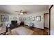 Cozy living room featuring hardwood floors, TV, and unique decor at 4920 Surfwood Dr, Sherrills Ford, NC 28673