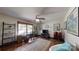 Living room with hardwood floors, desk area, tv and drumset at 4920 Surfwood Dr, Sherrills Ford, NC 28673