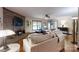 Spacious living room boasts a brick fireplace, hardwood floors, and ample natural light at 4920 Surfwood Dr, Sherrills Ford, NC 28673
