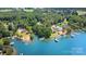 Aerial view of waterfront homes surrounded by lush greenery at 5075 Lakeview Cir, Sherrills Ford, NC 28673