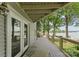 Back porch with sliding glass doors, furniture, and an incredible lake view at 5075 Lakeview Cir, Sherrills Ford, NC 28673