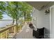 Spacious back porch with seating providing stunning lake views at 5075 Lakeview Cir, Sherrills Ford, NC 28673