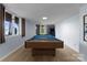Basement with a pool table, windows, and access to the outdoors at 5075 Lakeview Cir, Sherrills Ford, NC 28673