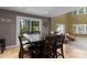 Dining area with a large table, chairs, and a sliding glass door to the outside deck at 5075 Lakeview Cir, Sherrills Ford, NC 28673